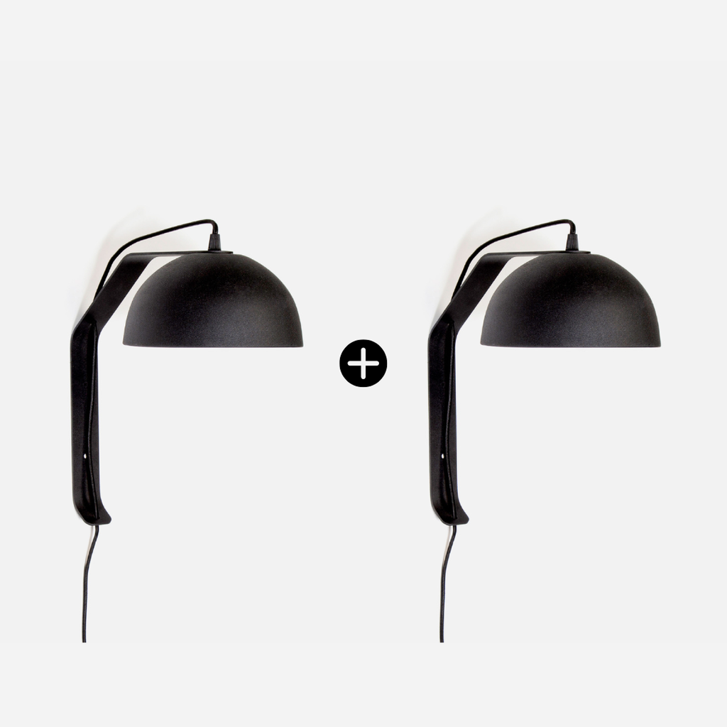 Two black wall lamps on a white background